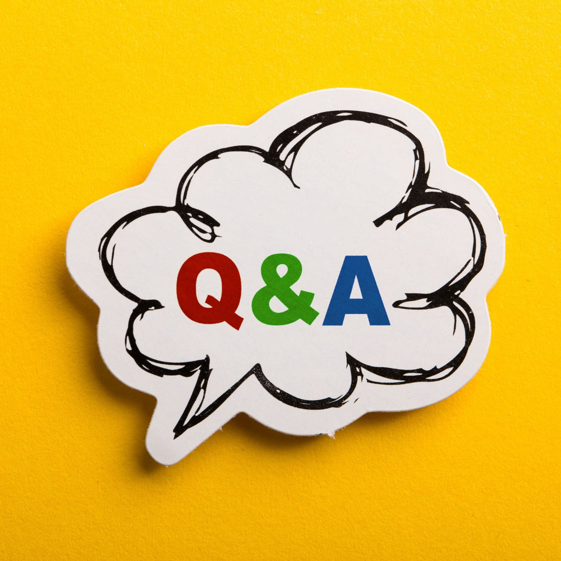 A cloud buble with a Q & A for questions and answers on a yellow background