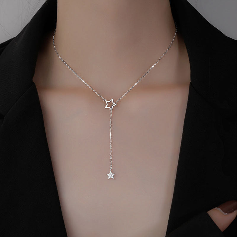 woman wearing a diamond silver start tassel