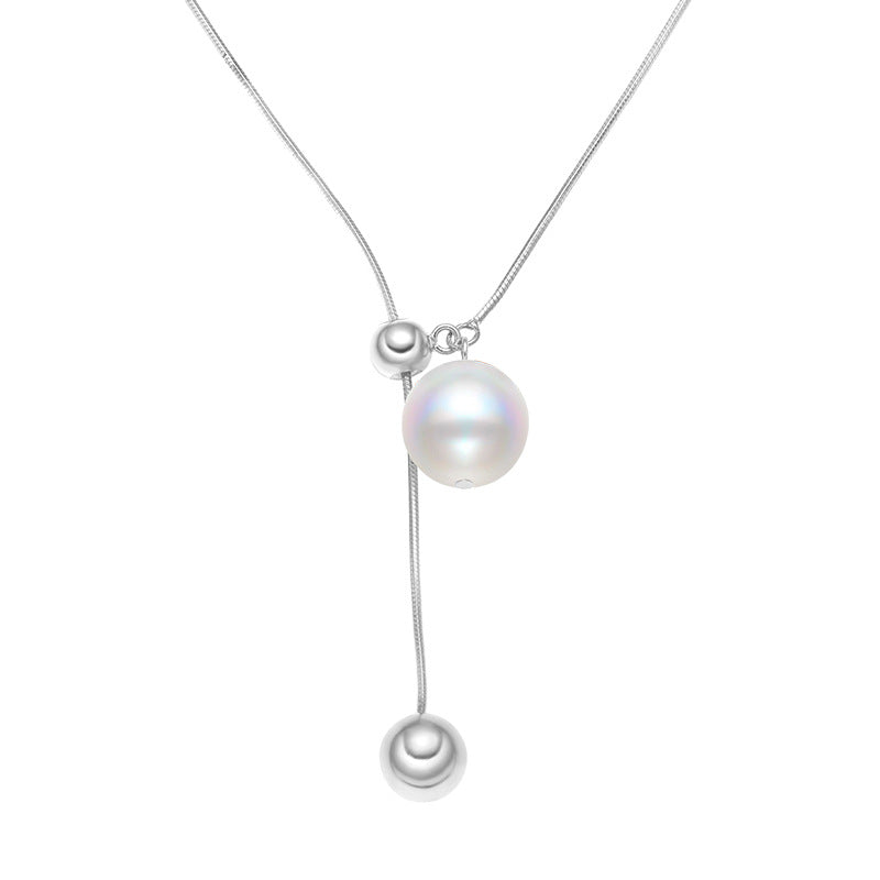 a sterling silver woman's necklace on a white canvas