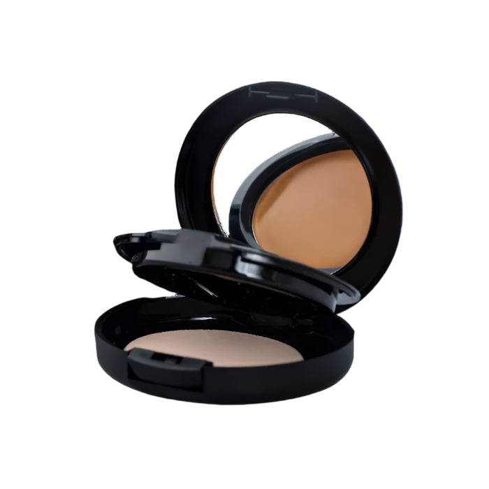 A black case of mineral concealer showing the shade and mirror