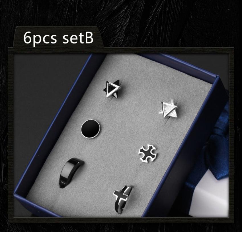 A earrings' box with 6 different pieces of ear studs on it