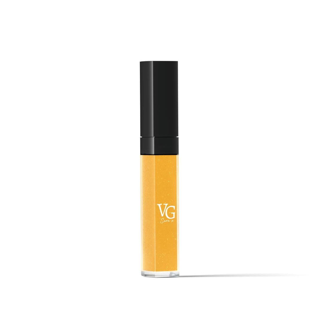 gold color vegan lip gloss, cruelty-free , vegan in a transparent container
