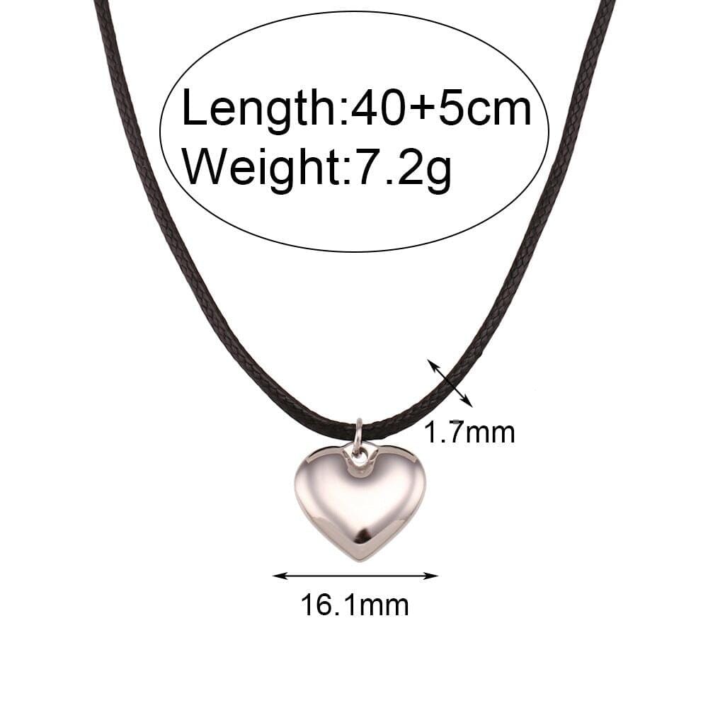 A rope chain with a silver heart pendant including its measures