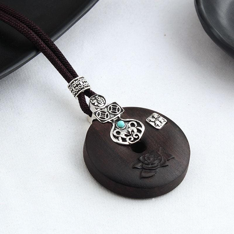 women long cotton and linen ebony wood pendant medieval symbols