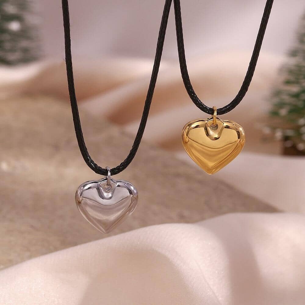 Two eco-friendly necklaces of heart pendants with a rope chain