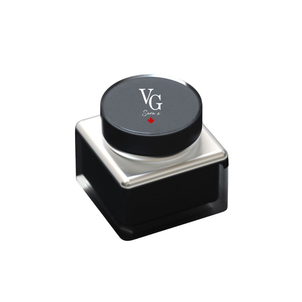 elegant container of anti-aging day cream with logo VG sara x and a red Canadian leaf