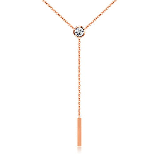 diamond tassel pendant rose gold neck lace on a white canvas