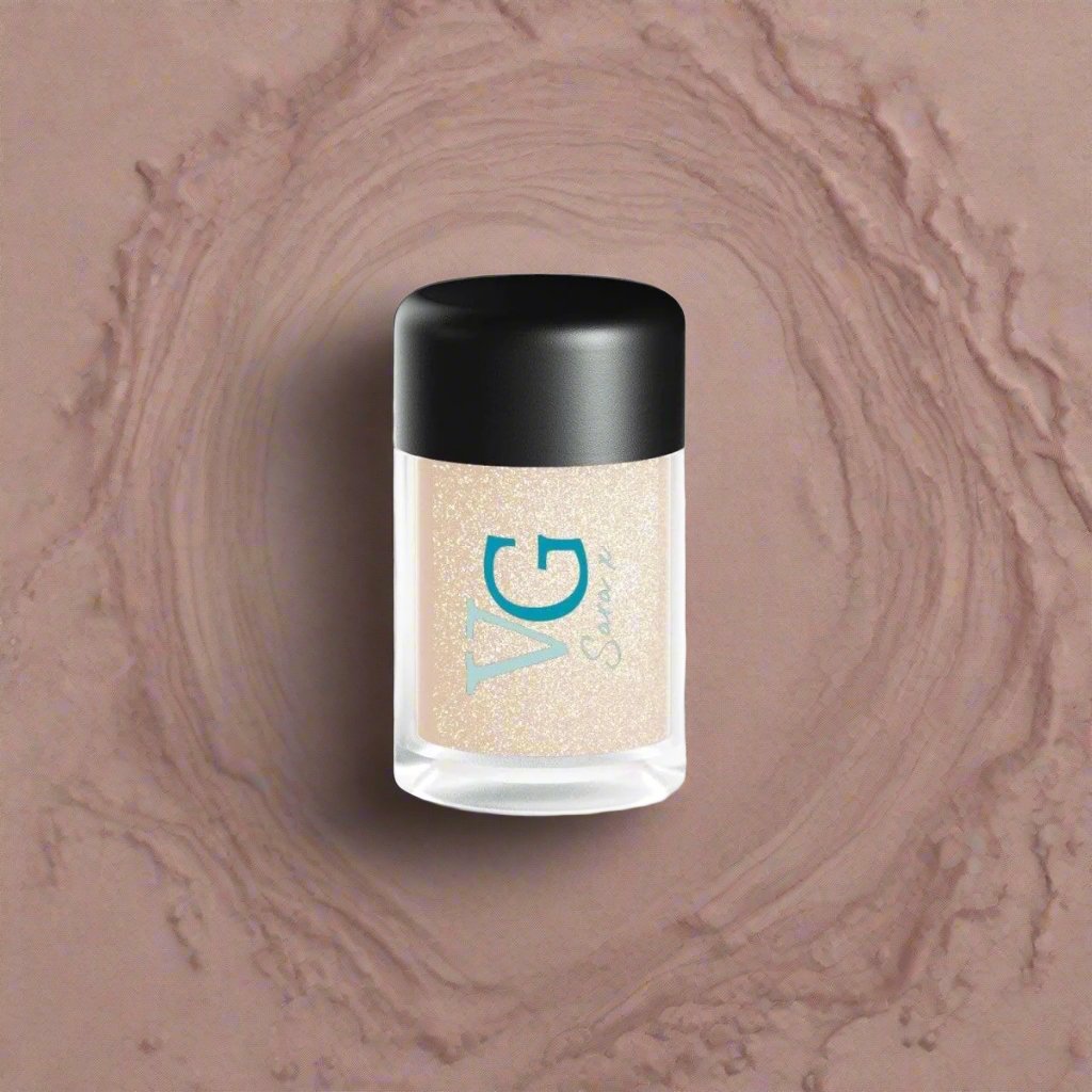 A bottle of fine Cruelty-Free Mineral Stardust Glitter on a pristine white surface