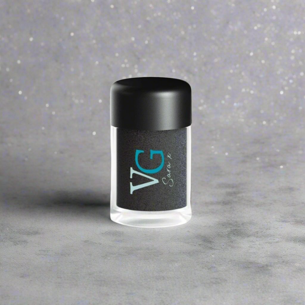 A black bottle of Cruelty-Free Mineral Stardust Glitter with 'VG' branding