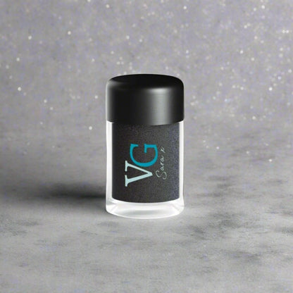 A black bottle of Cruelty-Free Mineral Stardust Glitter with 'VG' branding